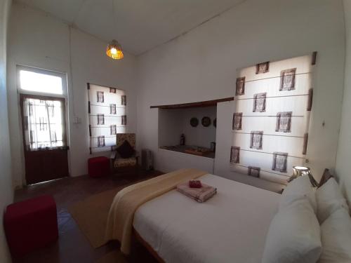 Giường trong phòng chung tại Outsiders B&B