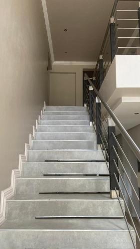 a set of stairs in a building at 1424 @ Jasmine in Hartbeespoort