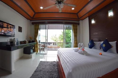 Postel nebo postele na pokoji v ubytování Vivi Boutique Room Hotel SHA Plus