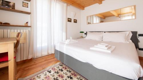 Кровать или кровати в номере Italianway - Sertorelli 60