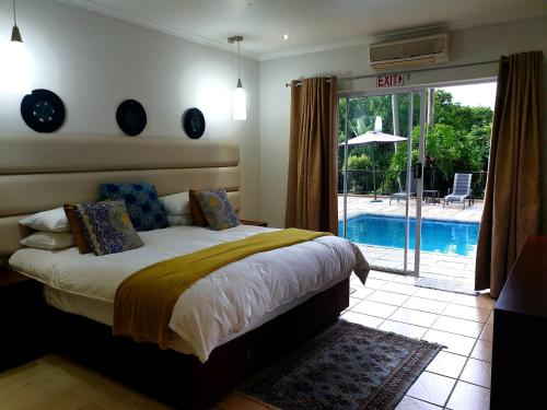 Ένα ή περισσότερα κρεβάτια σε δωμάτιο στο Damicha Boutique Lodge