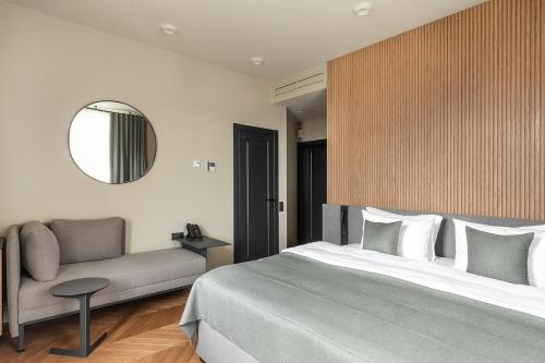 Ein Bett oder Betten in einem Zimmer der Unterkunft Potocki Boutique Hotel