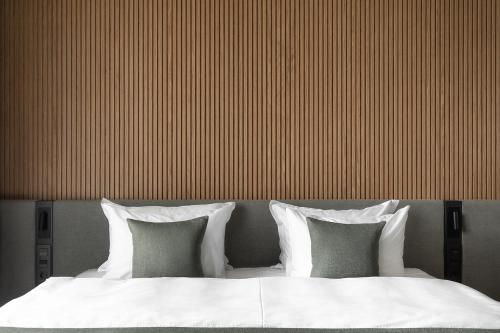 Ein Bett oder Betten in einem Zimmer der Unterkunft Potocki Boutique Hotel