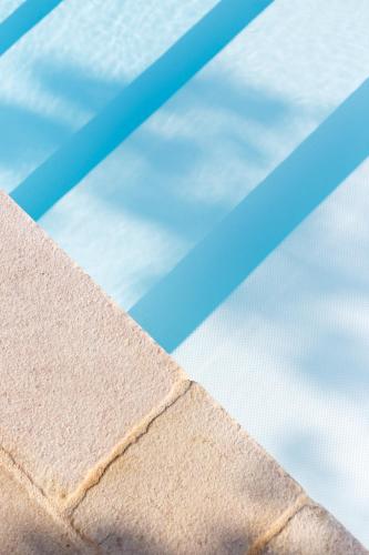 a piece of cardboard sitting on top of a mattress at Masseria Limonaia & Spa in Fasano