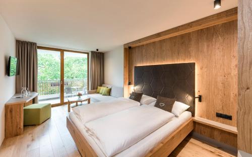 Postel nebo postele na pokoji v ubytování Hotel Birkenbrunn