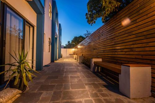 a hallway of a building with a wooden wall at Oceanway Boutique Hotel/Conference in Cape Town