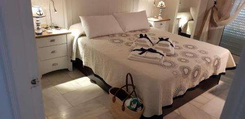 Кровать или кровати в номере Malva Loca Apartment