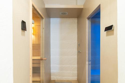 a door leading into a room with a hallway at Masseria Limonaia & Spa in Fasano