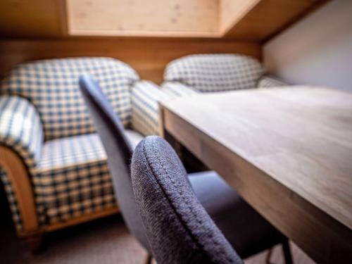 Letto o letti in una camera di Hotel Gletscherblick Grindelwald
