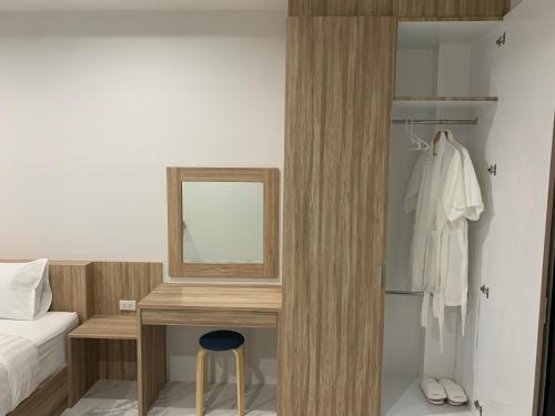 Ένα ή περισσότερα κρεβάτια σε δωμάτιο στο Nub Thong Residence
