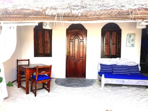 Ένα ή περισσότερα κρεβάτια σε δωμάτιο στο Peter Pan Beach Lodge