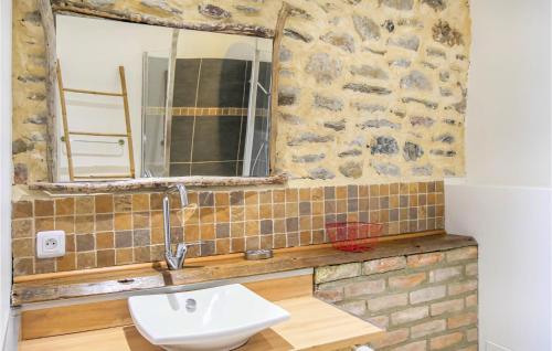 a bathroom with a sink and a mirror at 2 Bedroom Cozy Home In La Meauffe in La Meauffe