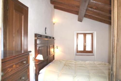 Ein Bett oder Betten in einem Zimmer der Unterkunft One bedroom house with shared pool furnished garden and wifi at Bibbiena