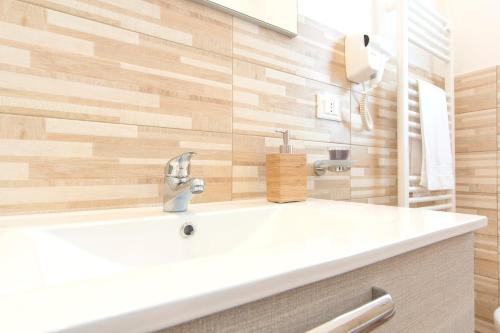 a bathroom with a sink and a mirror at One bedroom appartement with balcony and wifi at Marsala 5 km away from the beach in Marsala