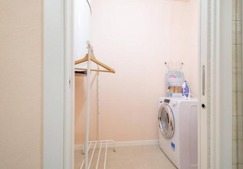 a laundry room with a washer and a washing machine at Charming apartment in Lastra a Signa with included parking in Lastra a Signa