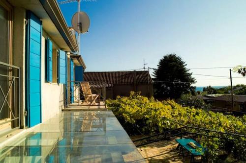 a house with a swimming pool next to a garden at Charming apartment in Zambratija, 44 sqm, Parking included in Zambratija
