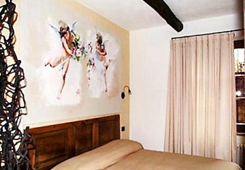 Postel nebo postele na pokoji v ubytování 6 bedrooms villa with private pool furnished garden and wifi at Mombarcaro