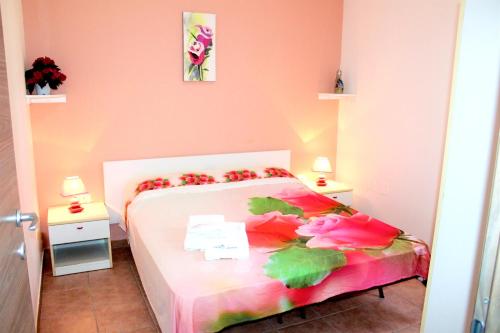 Letto o letti in una camera di 2 bedrooms house at Torre San Giovanni 700 m away from the beach with enclosed garden and wifi