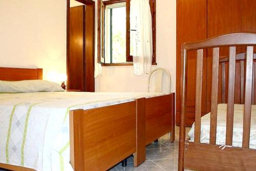 เตียงในห้องที่ 2 bedrooms appartement with shared pool furnished garden and wifi at Castrignano del Capo 4 km away from the beach