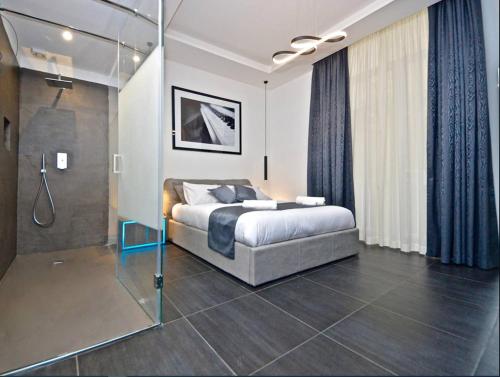 Un ou plusieurs lits dans un hébergement de l'établissement 3 bedrooms appartement with balcony and wifi at Napoli 5 km away from the beach