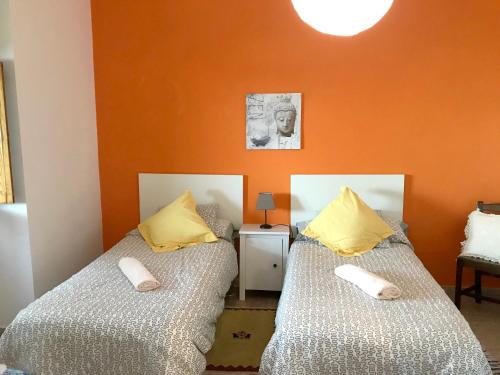 Postel nebo postele na pokoji v ubytování Charming house in Teror with garden