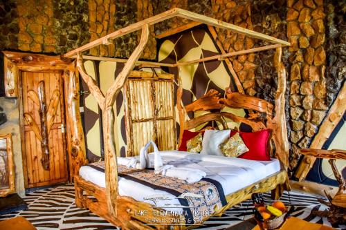 A bed or beds in a room at Lake Elementaita Nature Pebbles & Spar