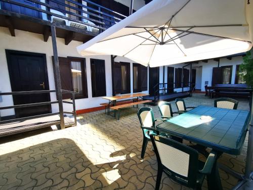 En balkon eller terrasse på Complex Tropical