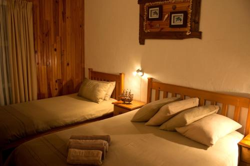 Postel nebo postele na pokoji v ubytování Bay Cove Inn