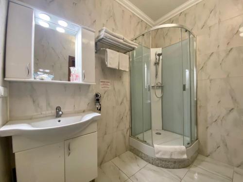 Ванная комната в Бумеранг Бизнес Отель 