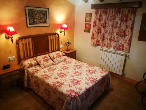 Postel nebo postele na pokoji v ubytování Cortijo Los Soledad