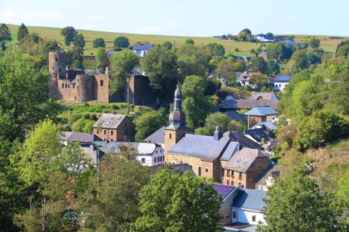 a small town with a castle and a church at Haus Zissi in Burg-Reuland