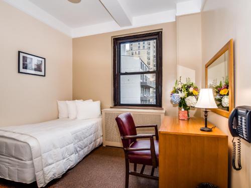 A bed or beds in a room at Leo House