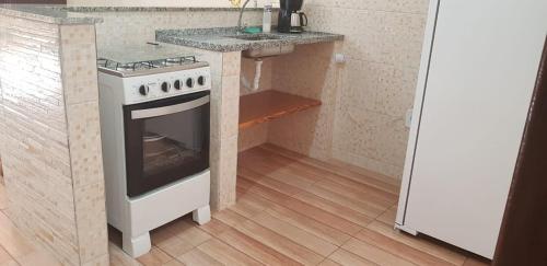 Η κουζίνα ή μικρή κουζίνα στο Pousada Refúgio Ninho Verde Jacone Saquarema
