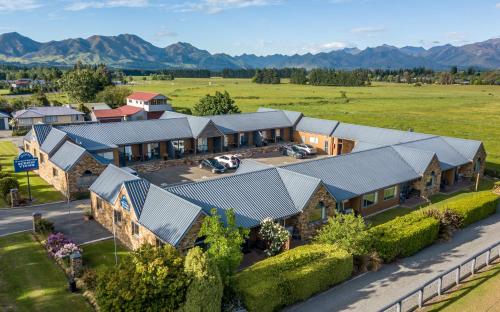 an aerial view of a house with metal roofs at Hanmer Springs Scenic Views Motel in Hanmer Springs