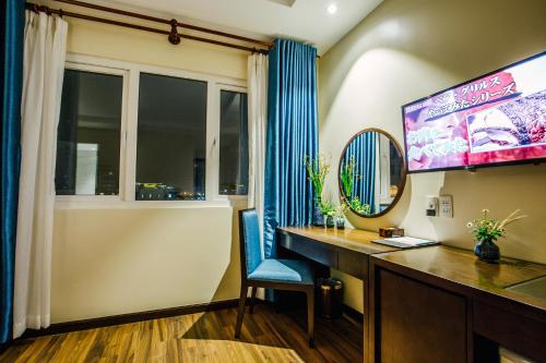 Μια τηλεόραση ή/και κέντρο ψυχαγωγίας στο Roseland Sweet Hotel