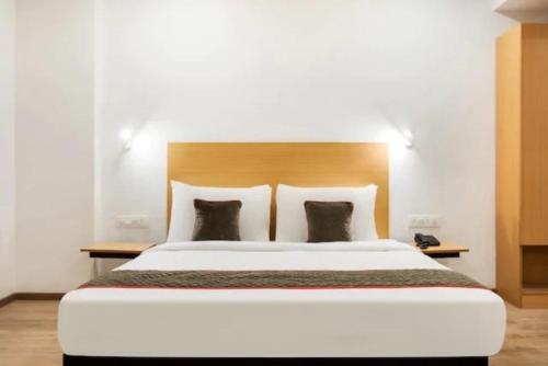 Ένα ή περισσότερα κρεβάτια σε δωμάτιο στο Alana Townhouse