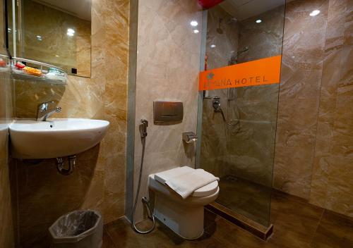 A bathroom at Miyana Hotel
