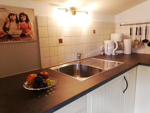 Virtuvė arba virtuvėlė apgyvendinimo įstaigoje Gästehaus Midi