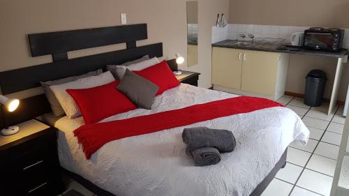 Accommodation@Park1285 tesisinde bir odada yatak veya yataklar