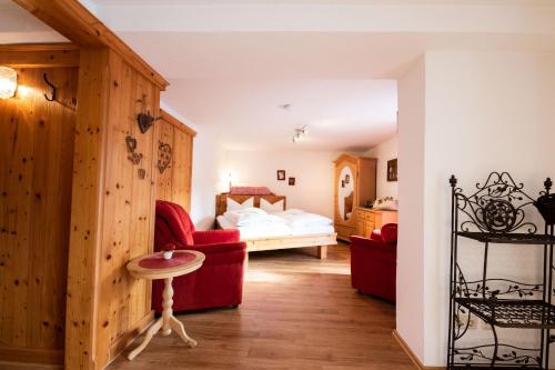 Posezení v ubytování Almstüberl