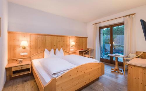 Posteľ alebo postele v izbe v ubytovaní Hotel Jonathan