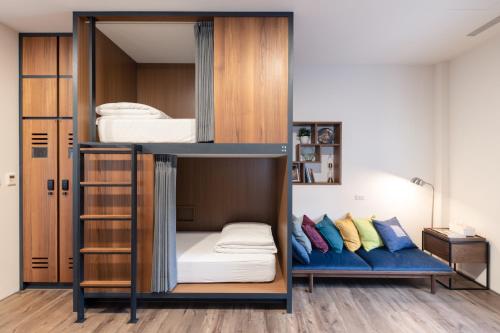 Postel nebo postele na pokoji v ubytování De Provintia Straat B&B