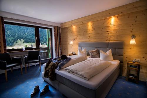 Ліжко або ліжка в номері Hotel Berghof