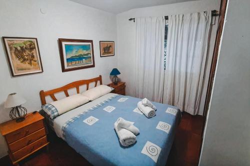 Кровать или кровати в номере Casa de Isabel