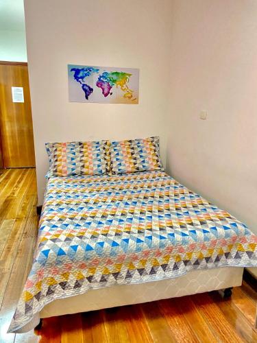 Ένα ή περισσότερα κρεβάτια σε δωμάτιο στο Maresias flat mata azul 2