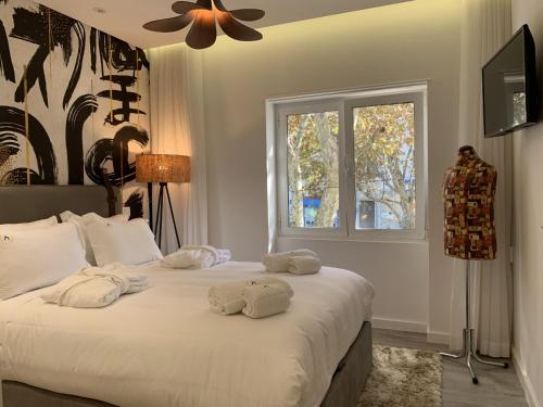Postel nebo postele na pokoji v ubytování Cascais Downtown Premium Apt 3 with terrace