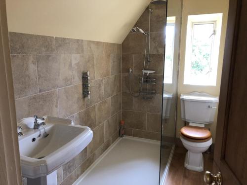 Ванна кімната в Beautiful 3 bedroomed Cotswolds Farmhouse