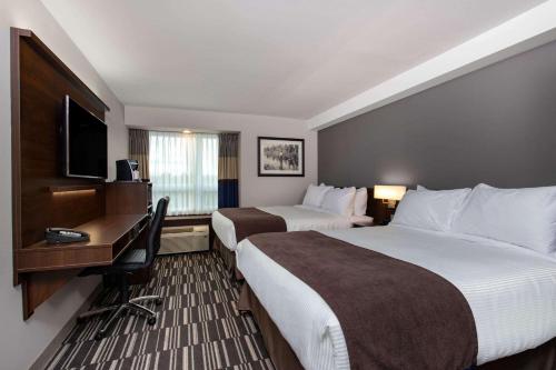 โทรทัศน์และ/หรือระบบความบันเทิงของ Microtel Inn & Suites by Wyndham Mont Tremblant