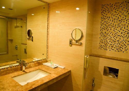 A bathroom at The Saibaba Hotel