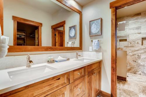 a bathroom with a sink and a mirror at Estates on Galena #8 townhouse in Frisco